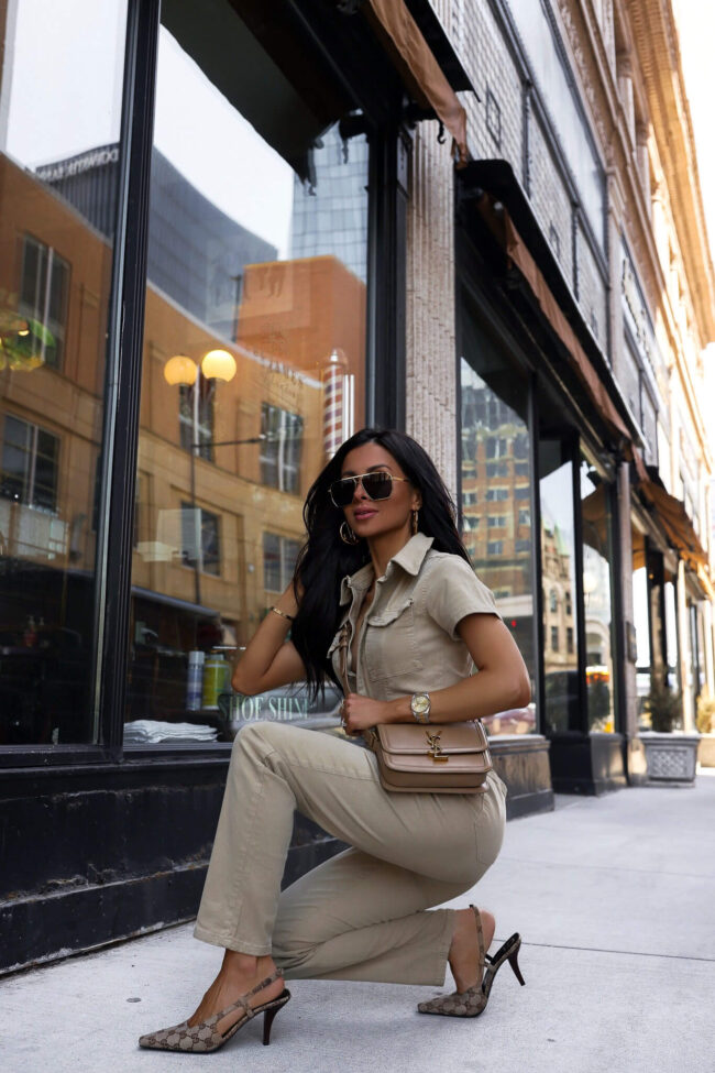 fashion blogger mia mia mine wearing a jumpsuit by good american