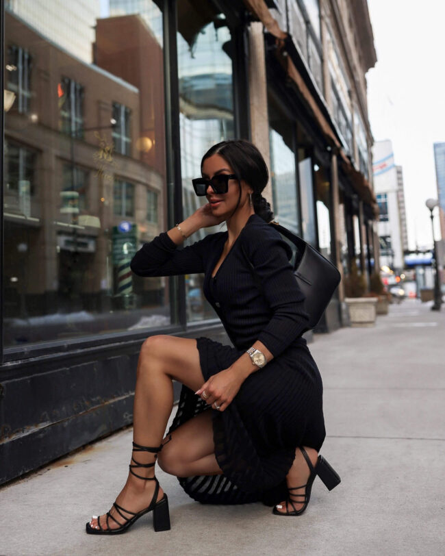 fashion blogger mia mia mine wearing a black knit skirt and matching set from walmart
