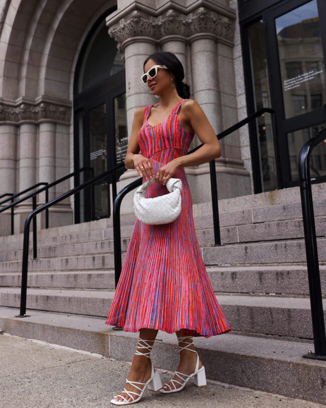 fashion blogger mia mia mine wearing a pink knit dress from walmart