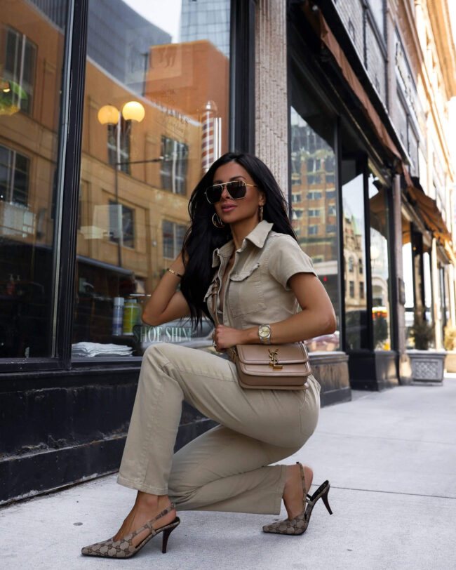 fashion blogger mia mia mine wearing a jumpsuit by good american