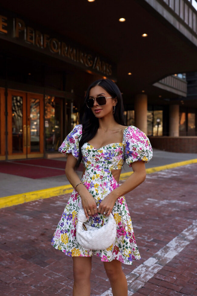 fashion blogger mia mia mine wearing a cutout floral dress for spring