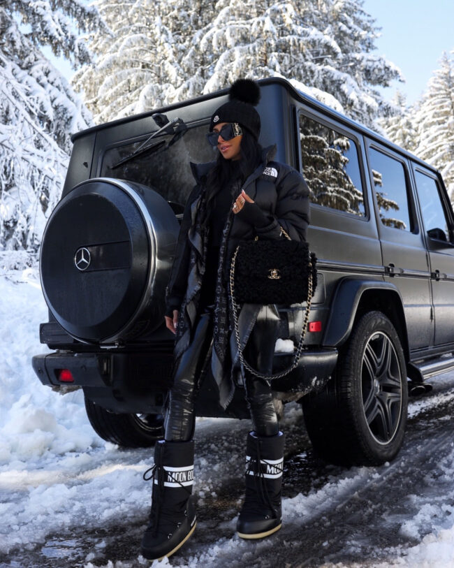 fashion blogger wearing an edgy snow outfit