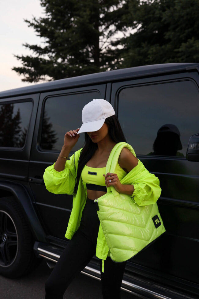 fashion blogger wearing a neon workout outfit from walmart