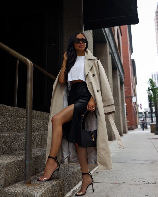 fashion blogger mia mia mine wearing a trench coat from mango