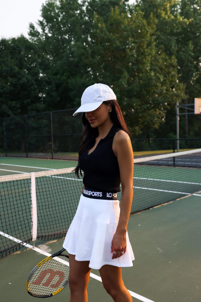fashion blogger wearing  an affordable tennis outfit 