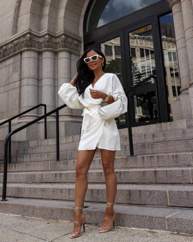 fashion blogger wearing a white wrap dress from nordstrom