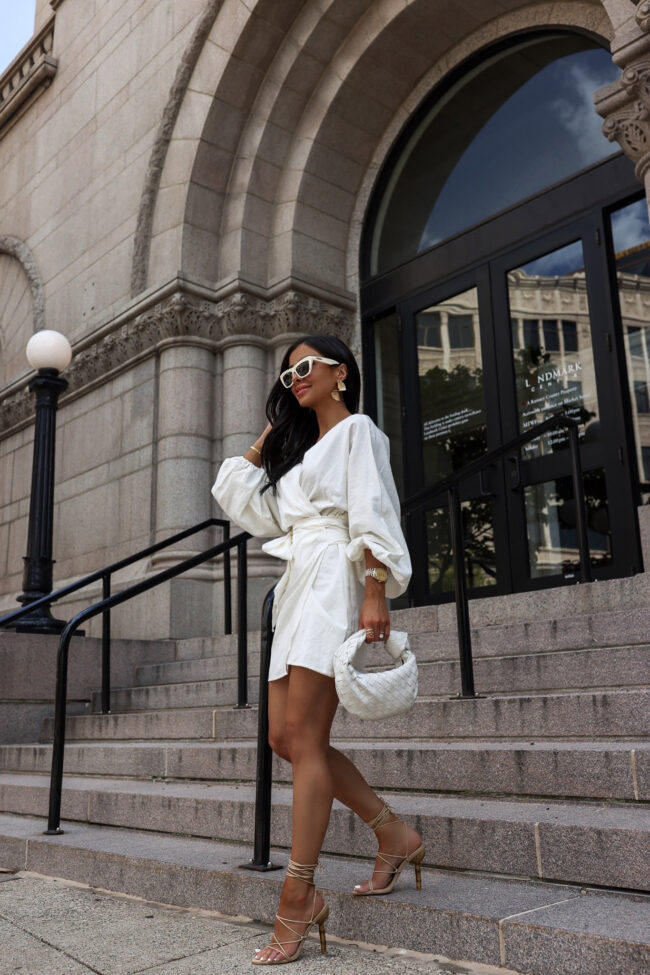 fashion blogger mia mia mine wearing a white wrap dress from nordstrom