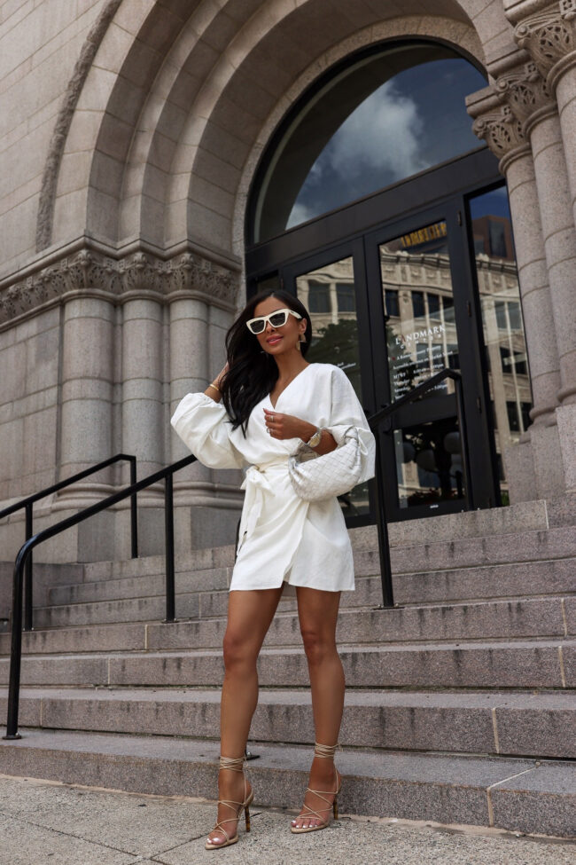 fashion blogger wearing a little white dress for summer