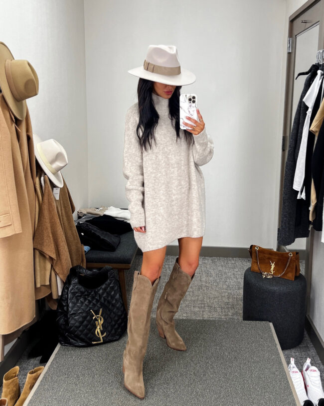 fashion blogger mia mia mine wearing a sweater dress and tall boots from the NSALE