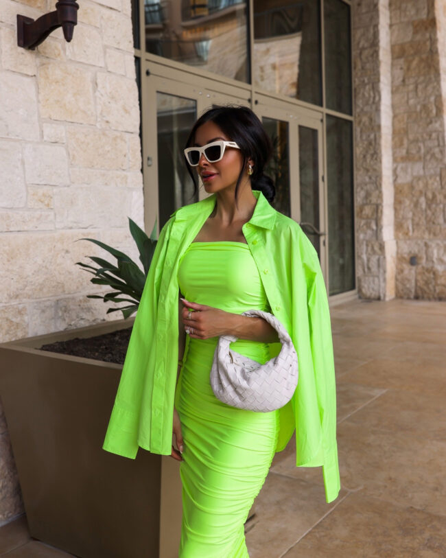 brunette fashion blogger wearing a neon green outfit for summer