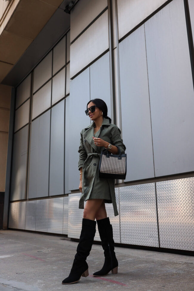 brunette fashion blogger wearing an olive trench coat for fall