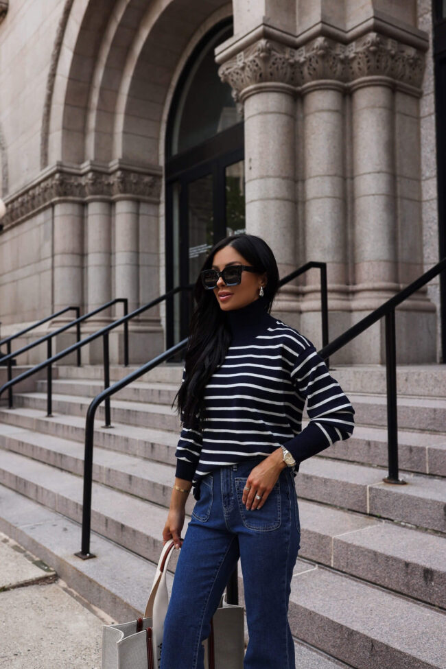 fashion blogger mia mia mine wearing a striped sweater from walmart