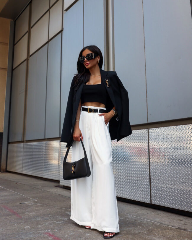 brunette fashion blogger wearing amazon white trousers