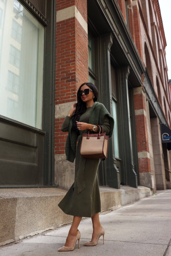 fashion blogger wearing a knit midi dress for work from walmart