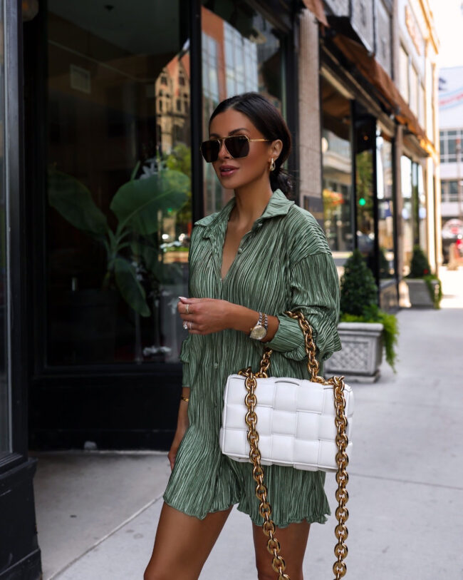 brunette fashion blogger wearing a green satin short set from amazon