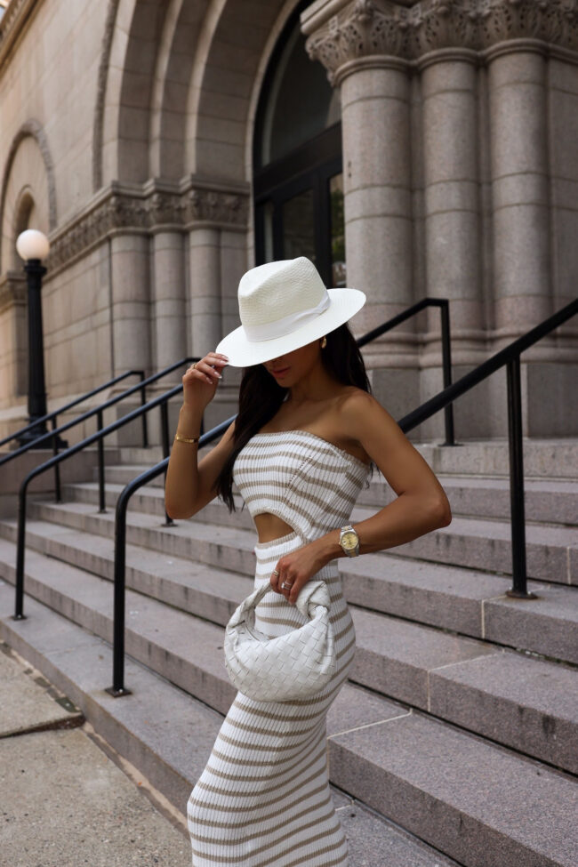 fashion blogger wearing a cutout stripe dress from amazon