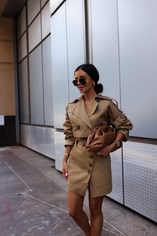 fashion blogger mia mia mine wearing a trench set from revolve