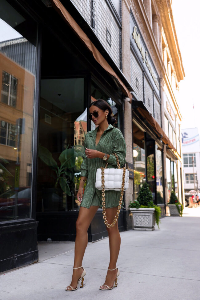 fashion blogger wearing a green plisse pleat set from amazon
