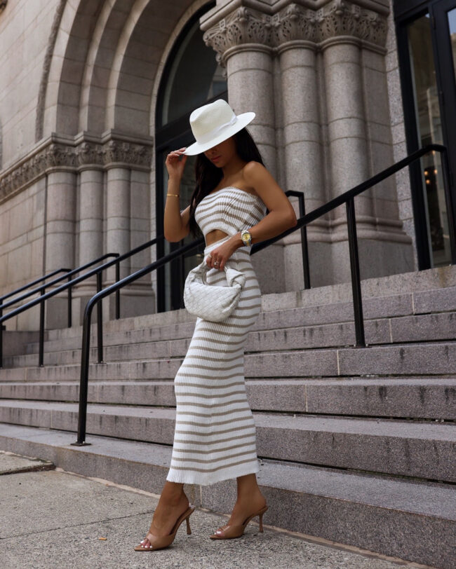 fashion blogger wearing a neutral stripe dress from amazon