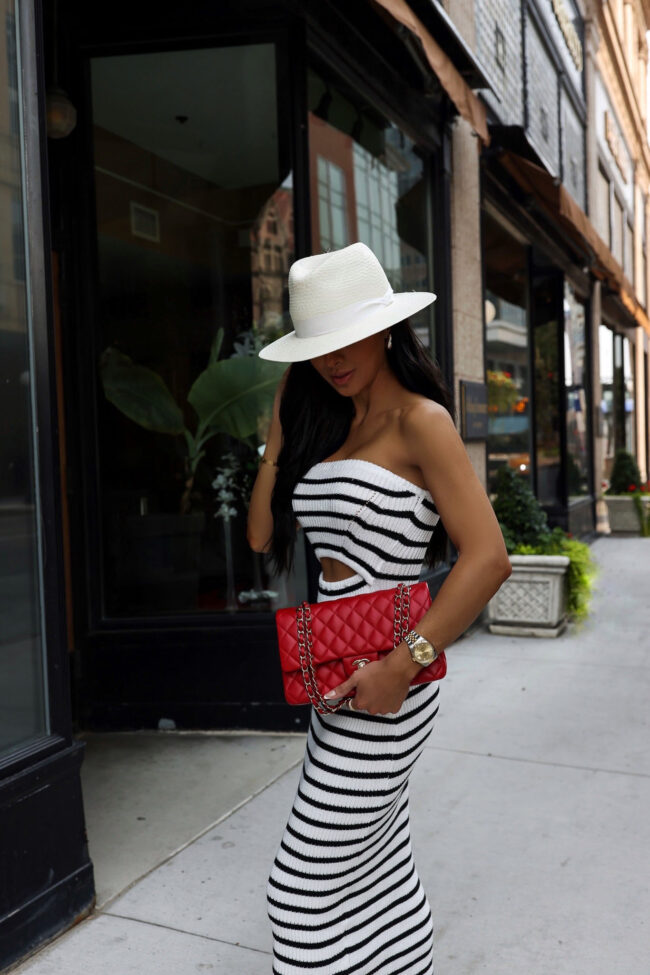 fashion blogger wearing a stripe knit dress from amazon