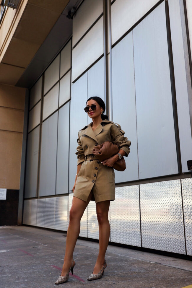 mia mia mine wearing a cropped trench from revolve