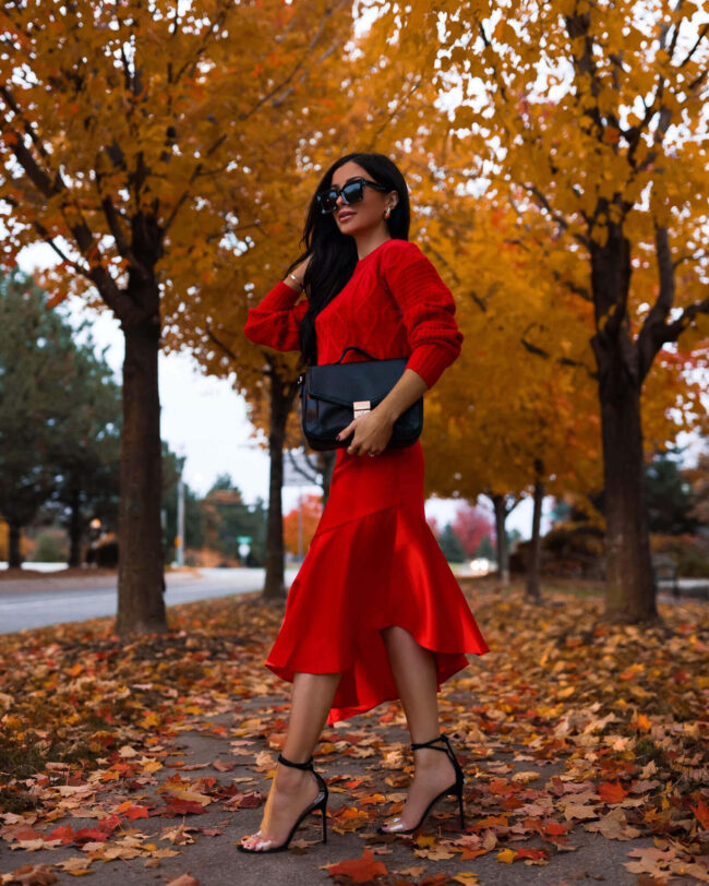 fashion blogger wearing a monochromatic red outfit for fall