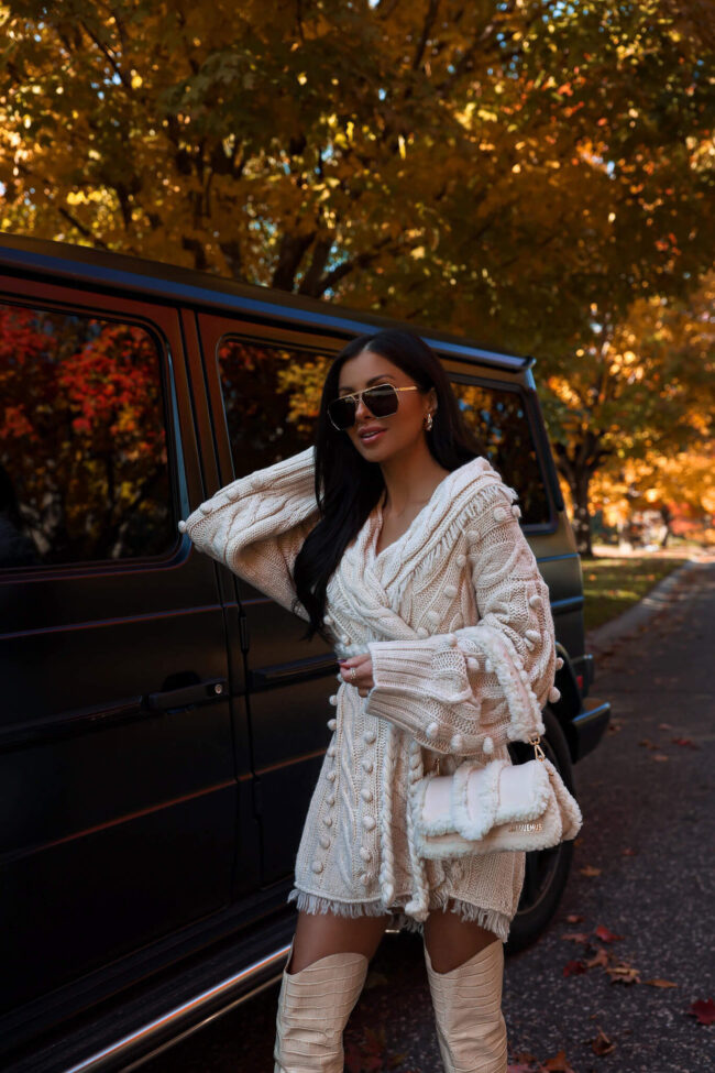 fashion blogger wearing a farm rio cable knit cardigan from saks fifth avenue
