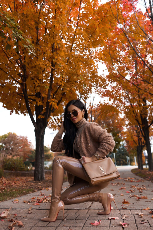 brunette fashion blogger wearing commando patent leather leggings for fall