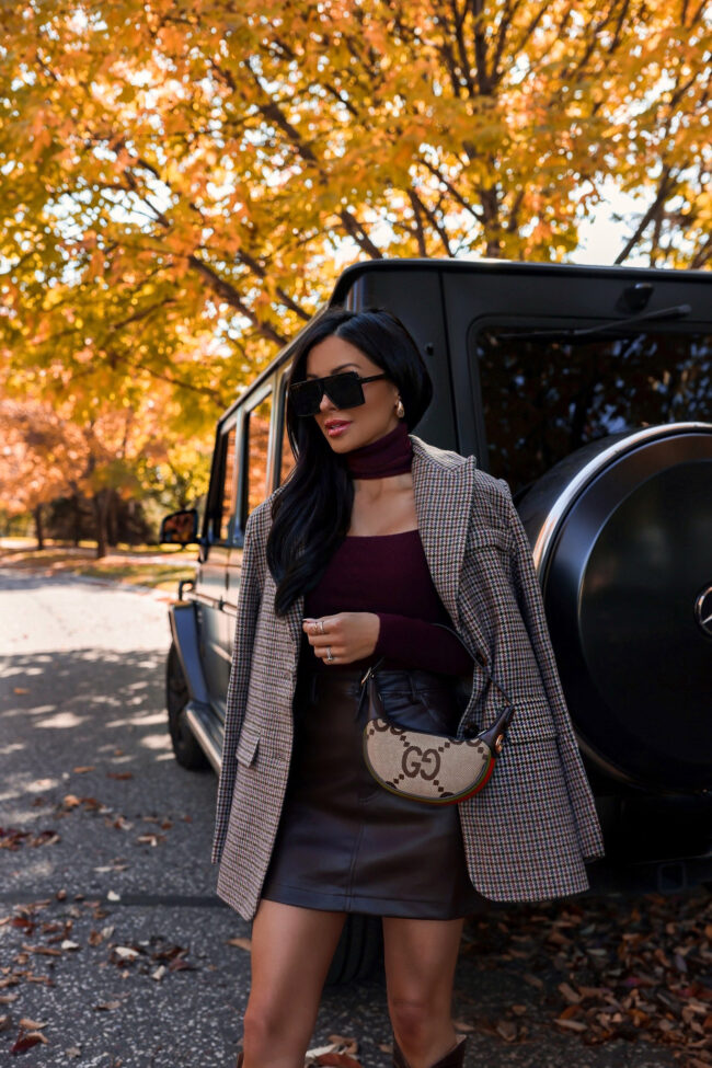 brunette fashion blogger wearing an astr the label plaid blazer