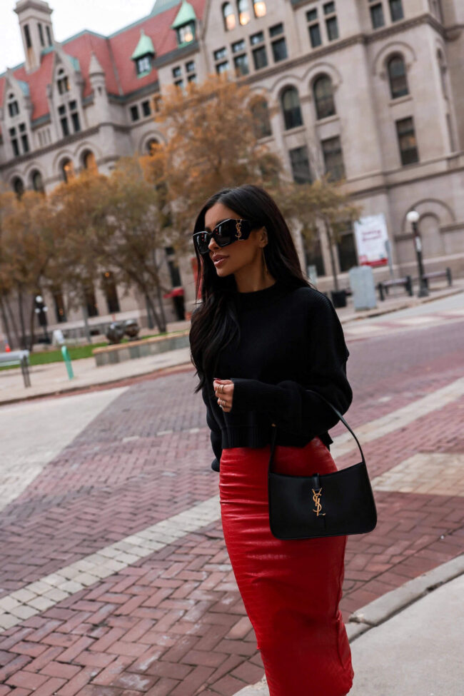 fashion blogger mia mia mine wearing a red faux leather skirt from nordstrom