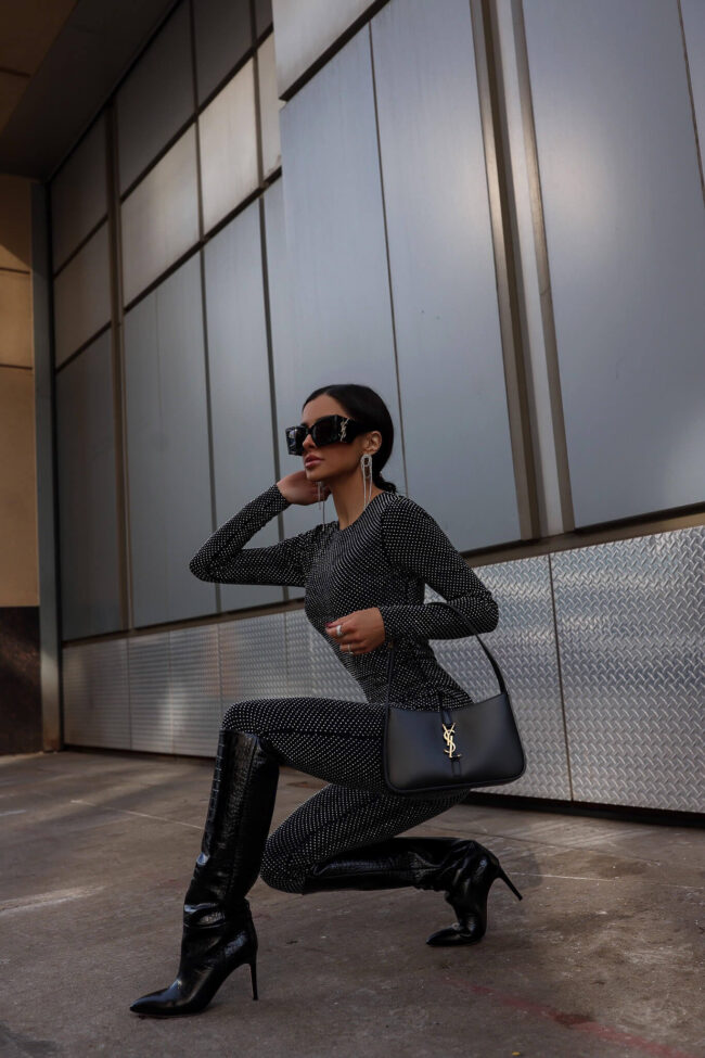 fashion blogger mia mia mine wearing a sequin catsuit from saks