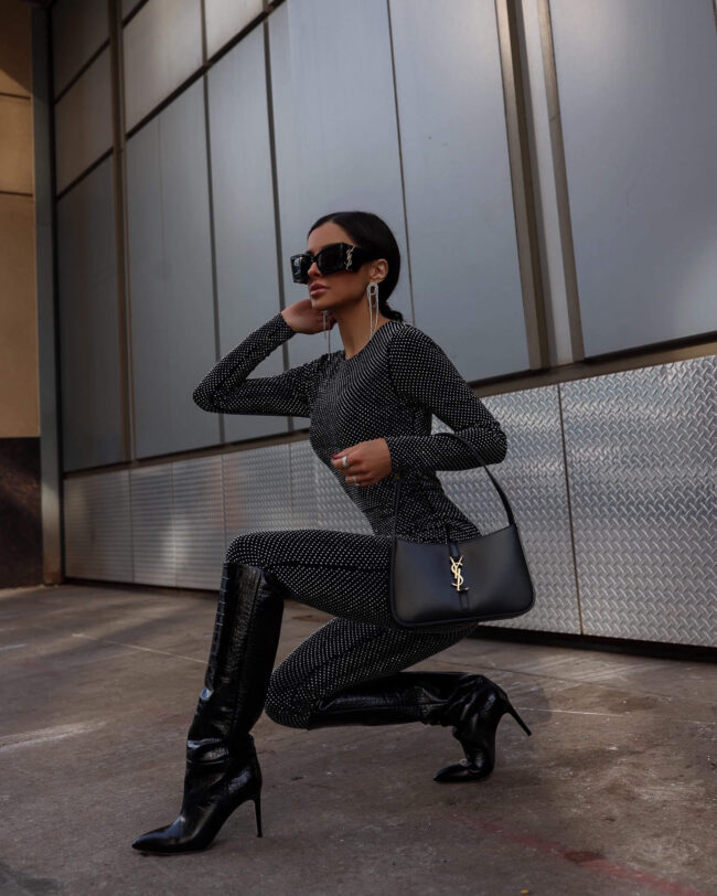 fashion blogger mia mia mine wearing a sequin catsuit from saks