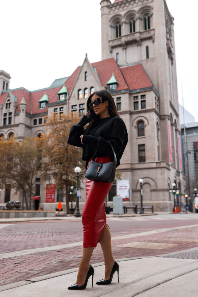 fashion blogger mia mia mine wearing a black crop sweater from nordstrom