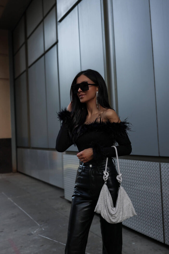 fashion blogger mia mia mine wearing a feather bodysuit from nordstrom
