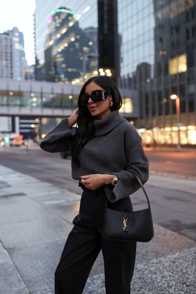 fashion blogger wearing a gray turtleneck sweater from revolve