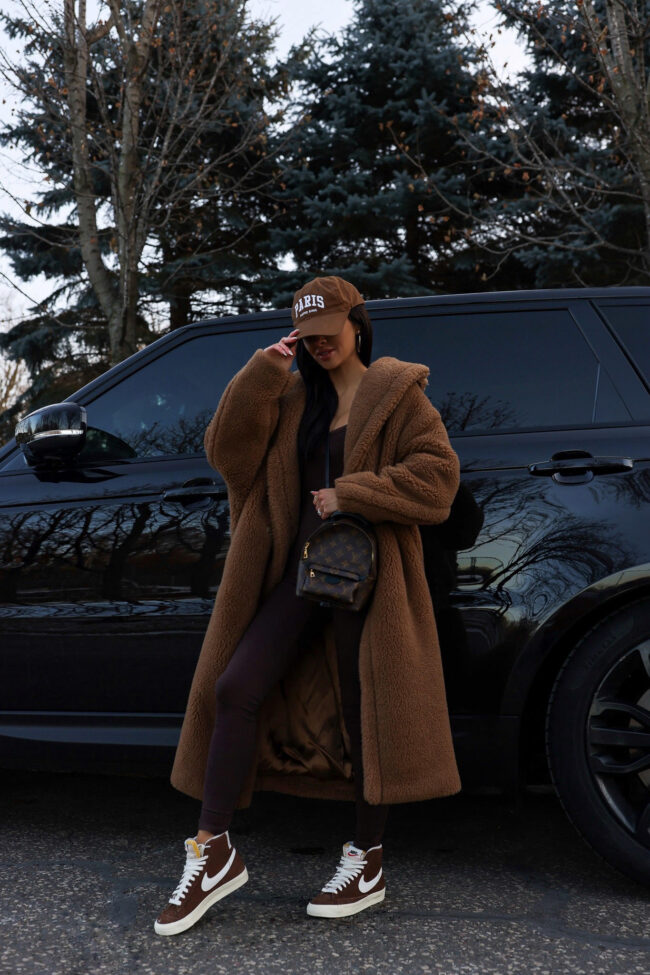 fashion blogger mia mia mine wearing a teddy bear coat by max mara