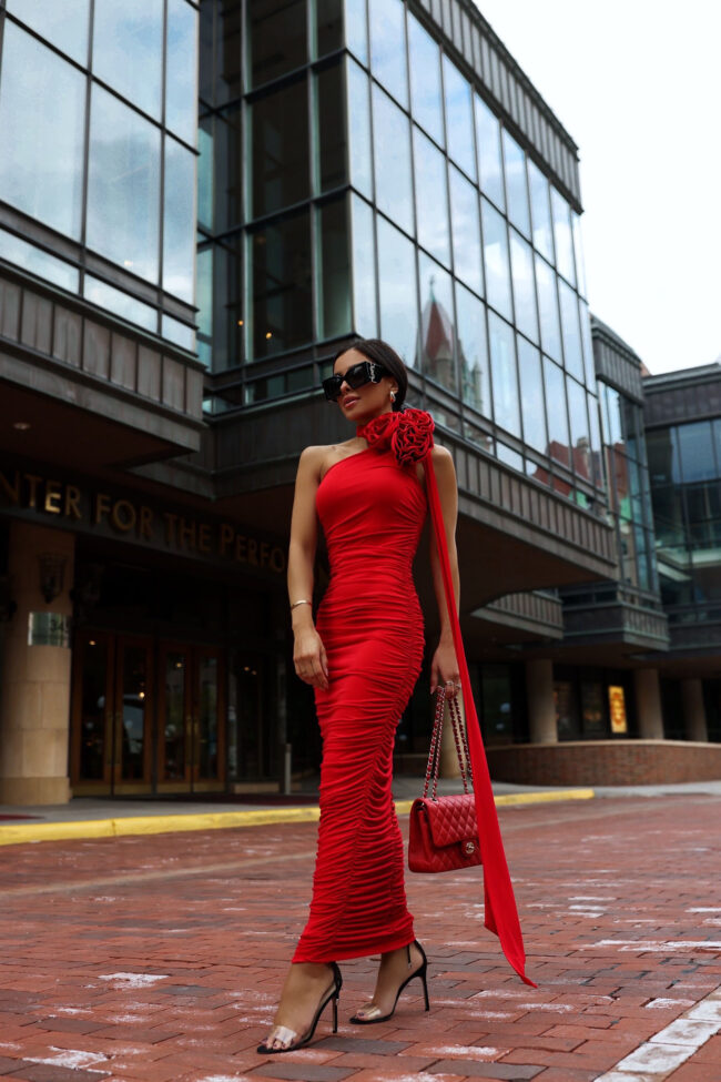 karen millen fashion blogger wearing a red rosette detail dress