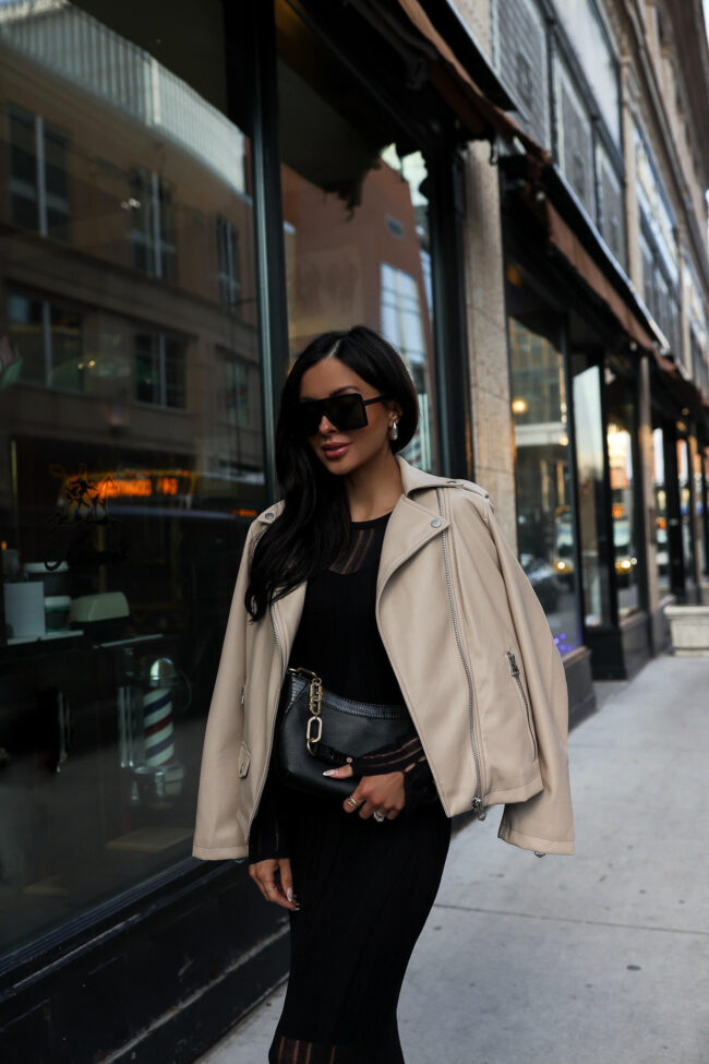 fashion blogger mia mia mine wearing a faux leather jacket from walmart