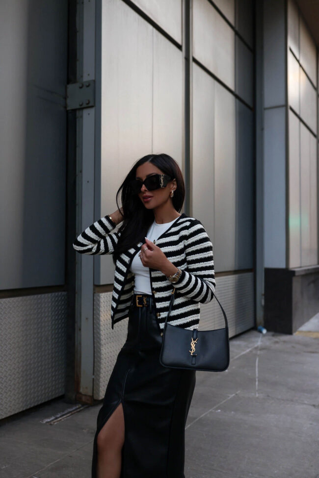 fashion blogger mia mia mine wearing a black and white striped cardigan from nordstrom