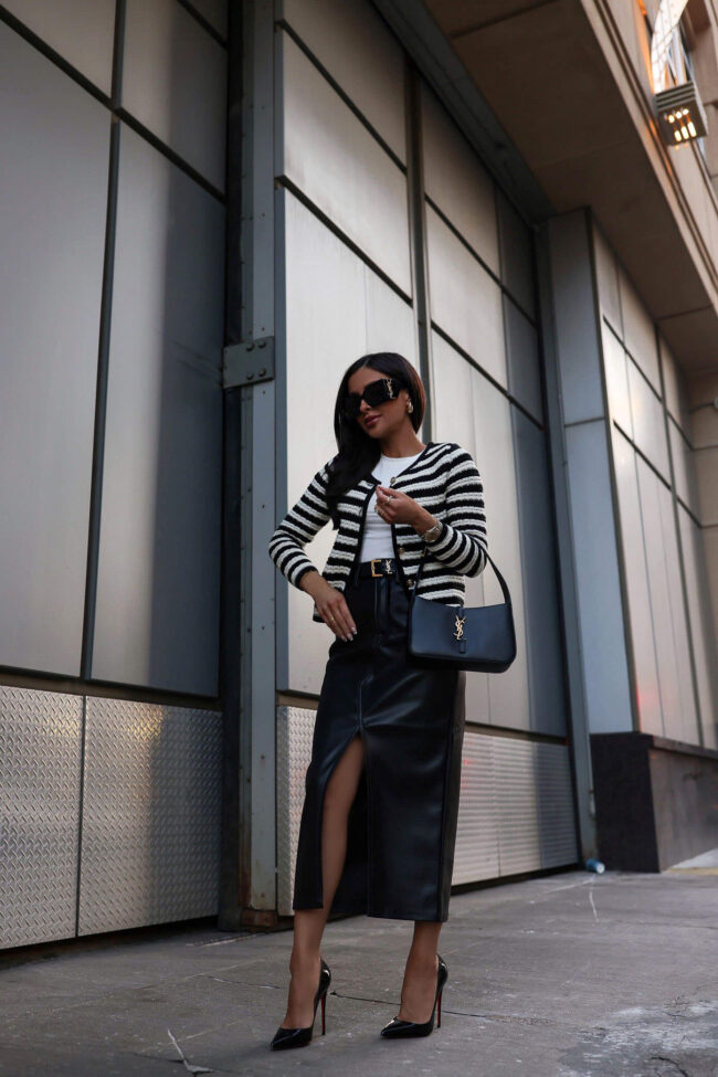 fashion blogger mia mia mine wearing a midi faux leather skirt from nordstrom