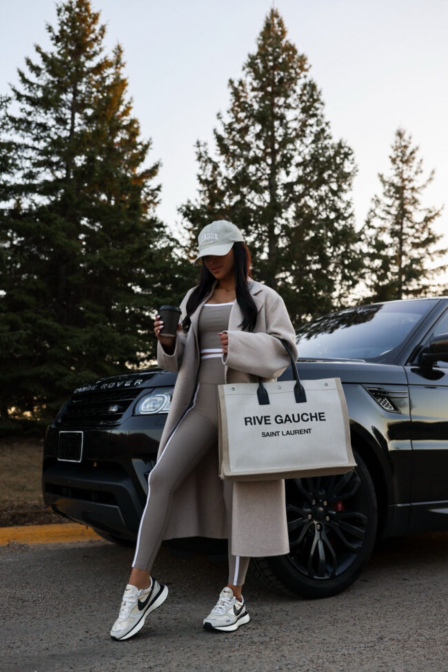 fashion blogger mia mia mine wearing a colorblock workout set from revolve