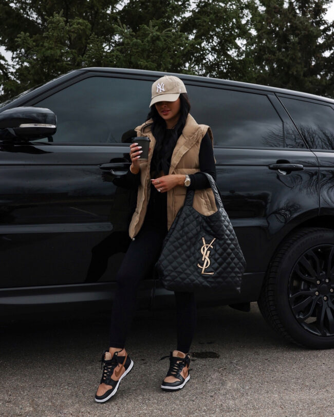 mia mia mine wearing a puffer vest and workout set from amazon