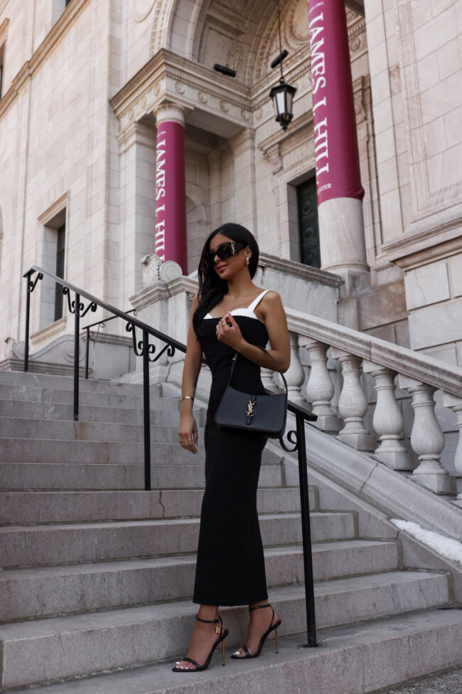 fashion blogger mia mia mine wearing a black and white dress by reformation