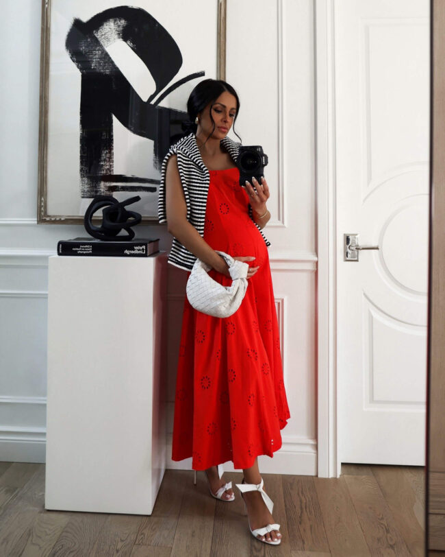 fashion blogger wearing a red eyelet dress from walmart