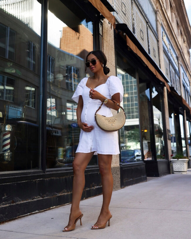 fashion blogger mia mia mine wearing a white linen dress from abercrombie