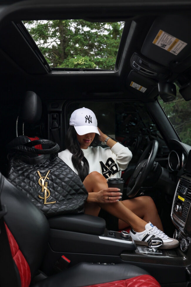 revolve fashion blogger wearing an anine bing sweatshirt