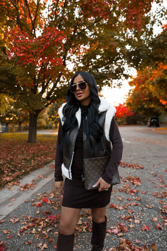 fashion blogger wearing a shearling vest for fall from walmart