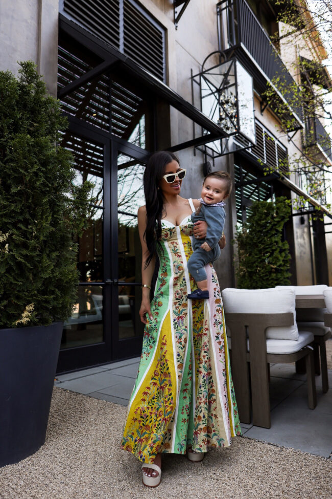 fashion blogger mia mia mine wearing a floral maxi dress from farm rio