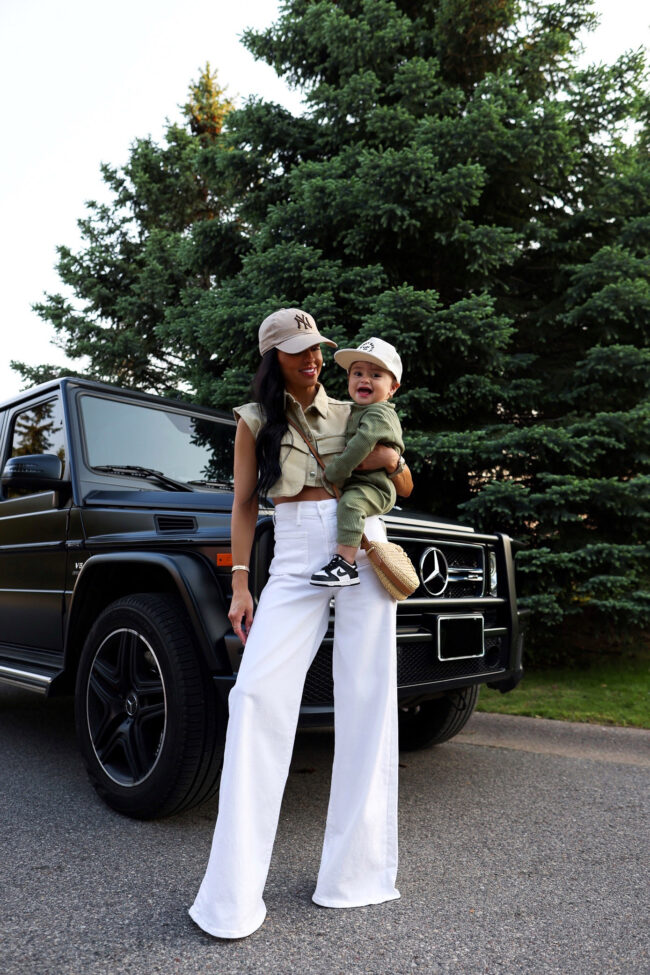 brunette fashion blogger and baby wearing casual summer outfits