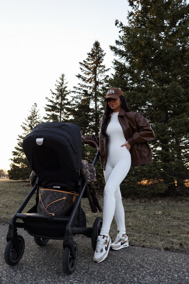 fashion blogger wearing a brown bomber jacket from shopbop